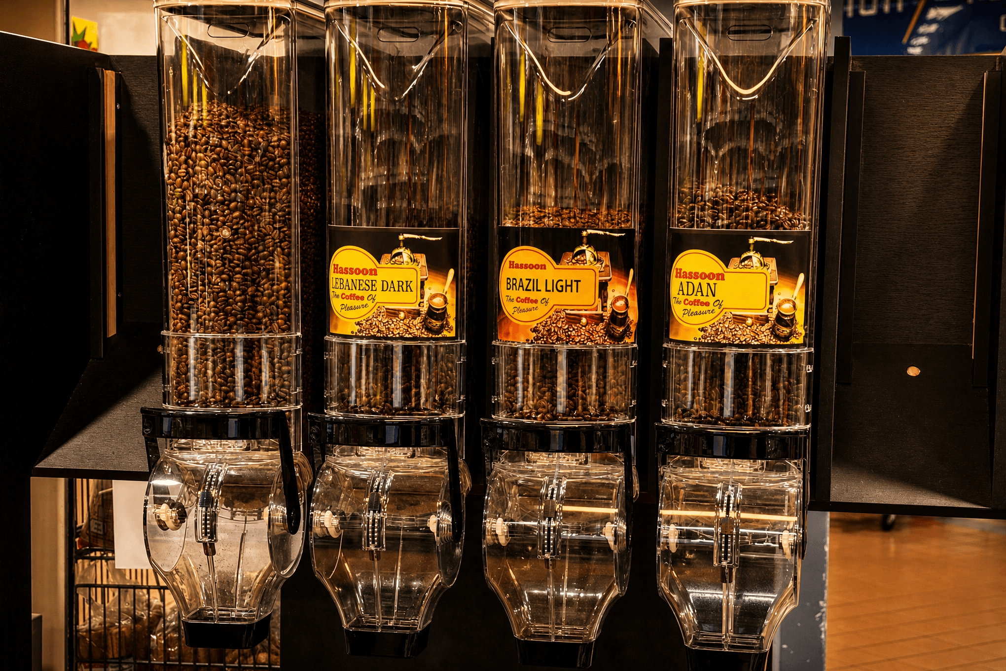 Coffee bean dispensers offering a variety of fresh-ground coffees